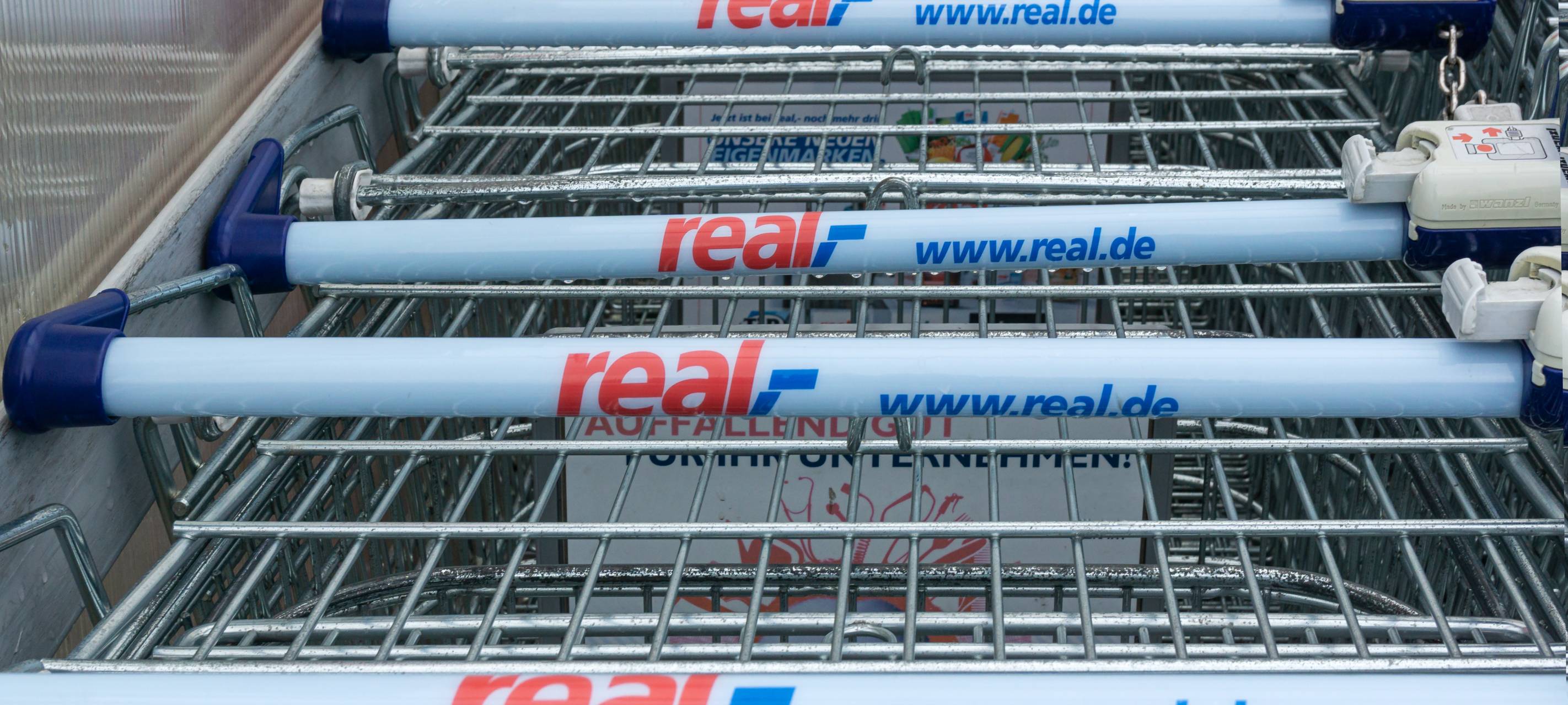 real im Rheinparkcenter Neuss schließt